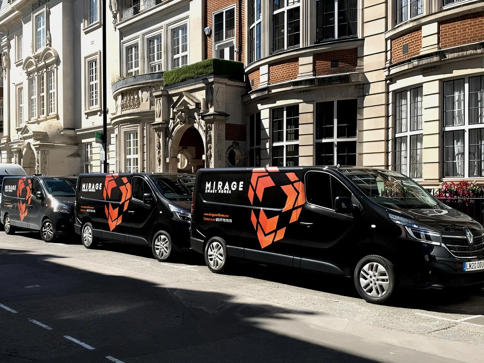 Mirage Smart Homes vans on a London street